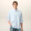 Camicie classiche a maniche lunghe in cotone blu con colletto button-down e ricamo ADC Camicie classiche a maniche lunghe in cotone blu con colletto button-down e ricamo ADC