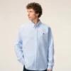 Camicie classiche a maniche lunghe in cotone blu con colletto button-down e ricamo ADC Camicie classiche a maniche lunghe in cotone blu con colletto button-down e ricamo ADC