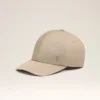 Cappellino Ami de Coeur in nylon beige con borchie Cappellino Ami de Coeur in nylon beige con borchie
