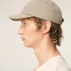 Cappellino Ami de Coeur in nylon beige con borchie Cappellino Ami de Coeur in nylon beige con borchie