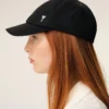 Cappellino Ami de Coeur in nylon nero con borchie Cappellino Ami de Coeur in nylon nero con borchie