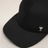 Cappellino Ami de Coeur in nylon nero con borchie Cappellino Ami de Coeur in nylon nero con borchie