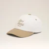 Cappellino Ami Paris in cotone bicolore beige e bianco Cappellino Ami Paris in cotone bicolore beige e bianco