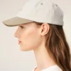 Cappellino Ami Paris in cotone bicolore beige e bianco Cappellino Ami Paris in cotone bicolore beige e bianco