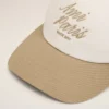 Cappellino Ami Paris in cotone bicolore beige e bianco Cappellino Ami Paris in cotone bicolore beige e bianco