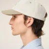 Cappellino Ami Paris in cotone bicolore beige e bianco Cappellino Ami Paris in cotone bicolore beige e bianco