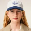 Cappellino Ami Paris in cotone bicolore blu e bianco Cappellino Ami Paris in cotone bicolore blu e bianco