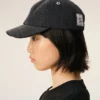 Cappellino Ami Paris in denim nero con toppa laterale Cappellino Ami Paris in denim nero con toppa laterale