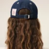 Cappellino con toppa laterale Ami Paris in denim blu Cappellino con toppa laterale Ami Paris in denim blu