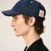 Cappellino con toppa laterale Ami Paris in denim blu Cappellino con toppa laterale Ami Paris in denim blu