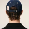 Cappellino con toppa laterale Ami Paris in denim blu Cappellino con toppa laterale Ami Paris in denim blu