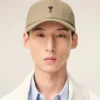 Cappellino in cotone beige con ricamo Ami de Coeur Cappellino in cotone beige con ricamo Ami de Coeur