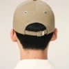 Cappellino in cotone beige con ricamo Ami de Coeur Cappellino in cotone beige con ricamo Ami de Coeur