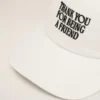 Cappellino in cotone bianco con ricamo “Thank You for Being a Friend” Cappellino in cotone bianco con ricamo “Thank You for Being a Friend”