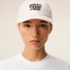 Cappellino in cotone bianco con ricamo “Thank You for Being a Friend” Cappellino in cotone bianco con ricamo “Thank You for Being a Friend”