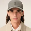 Cappellino in cotone grigio con ricamo Ami de Coeur Cappellino in cotone grigio con ricamo Ami de Coeur