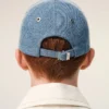Cappellino in denim blu con ricamo “Ami de Coeur” Cappellino in denim blu con ricamo “Ami de Coeur”