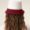 Cappello Ami Paris in cotone rosso e bianco Cappello Ami Paris in cotone rosso e bianco