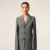 Cappotto aderente a un rigo in lana vergine grigia Cappotto aderente a un rigo in lana vergine grigia