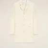 Cappotto bianco in lana vergine, dritto, a un rigo Cappotto bianco in lana vergine, dritto, a un rigo