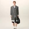 Cappotto grigio in lana vergine, dritto, a un rigo Cappotto grigio in lana vergine, dritto, a un rigo