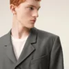 Cappotto grigio in lana vergine, dritto, a un rigo Cappotto grigio in lana vergine, dritto, a un rigo