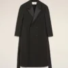 Cappotto lungo doppiopetto in lana nera smockata Cappotto lungo doppiopetto in lana nera smockata