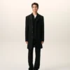Cappotto nero in lana vergine, dritto, a un rigo Cappotto nero in lana vergine, dritto, a un rigo