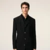 Cappotto nero in lana vergine, dritto, a un rigo Cappotto nero in lana vergine, dritto, a un rigo