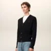 Cardigan in lana nera con Ami de Coeur a contrasto Cardigan in lana nera con Ami de Coeur a contrasto