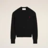 Cardigan nero in lana a girocollo con Ami de Coeur a contrasto Cardigan nero in lana a girocollo con Ami de Coeur a contrasto