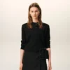 Cardigan nero in lana a girocollo con Ami de Coeur a contrasto Cardigan nero in lana a girocollo con Ami de Coeur a contrasto