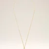 Collana con ciondolo “0” in ottone martellato dorato Collana con ciondolo “0” in ottone martellato dorato