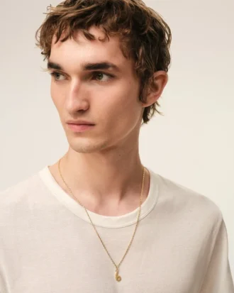 Collana con ciondolo “6” in ottone martellato