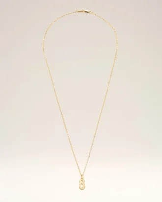 Collana con ciondolo “8” in ottone martellato dorato