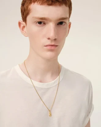 Collana con ciondolo “8” in ottone martellato dorato