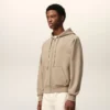 Felpa con cappuccio e zip Ami de Coeur in cotone beige goffrato Felpa con cappuccio e zip Ami de Coeur in cotone beige goffrato