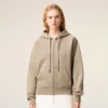 Felpa con cappuccio e zip Ami de Coeur in cotone beige goffrato Felpa con cappuccio e zip Ami de Coeur in cotone beige goffrato