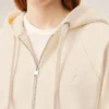 Felpa con cappuccio e zip Ami de Coeur in cotone bianco goffrato Felpa con cappuccio e zip Ami de Coeur in cotone bianco goffrato