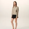Giacca Ami de Coeur in nylon beige con bottoni a borchia Giacca Ami de Coeur in nylon beige con bottoni a borchia