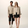 Giacca Ami de Coeur in nylon beige con bottoni a borchia Giacca Ami de Coeur in nylon beige con bottoni a borchia