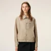 Giacca Ami de Coeur in nylon beige con bottoni a borchia Giacca Ami de Coeur in nylon beige con bottoni a borchia