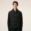 Giacca Ami de Coeur in nylon nero con bottoni a pressione Giacca Ami de Coeur in nylon nero con bottoni a pressione