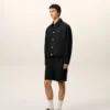 Giacca Ami de Coeur in nylon nero con bottoni a pressione Giacca Ami de Coeur in nylon nero con bottoni a pressione