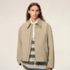 Giacca con zip in cotone beige Giacca con zip in cotone beige