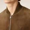 Giacca con zip in pelle marrone