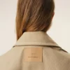 Giacca da lavoro in cotone beige con bottoni