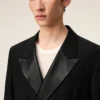 Giacca dritta a doppio petto in lana vergine nera con smock Giacca dritta a doppio petto in lana vergine nera con smock