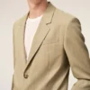 Giacca dritta monopetto in lana vergine beige Giacca dritta monopetto in lana vergine beige