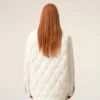 Giacca imbottita in nylon bianco con bottoni Giacca imbottita in nylon bianco con bottoni